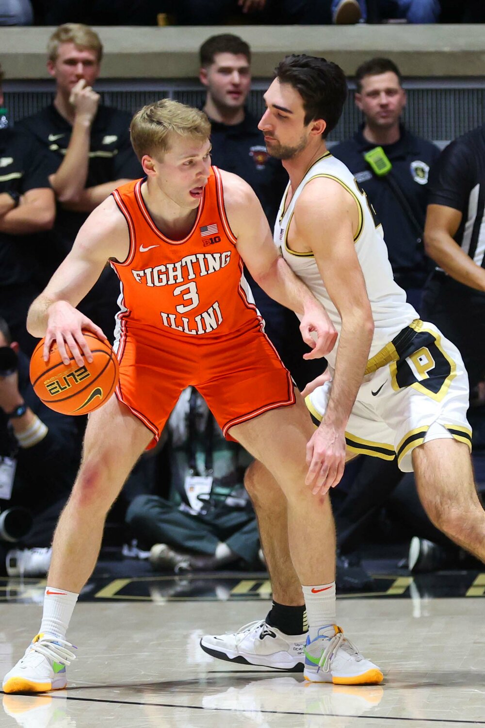 Ethan Morton of Purdue - bodying up on Marcus Domask of Illinois