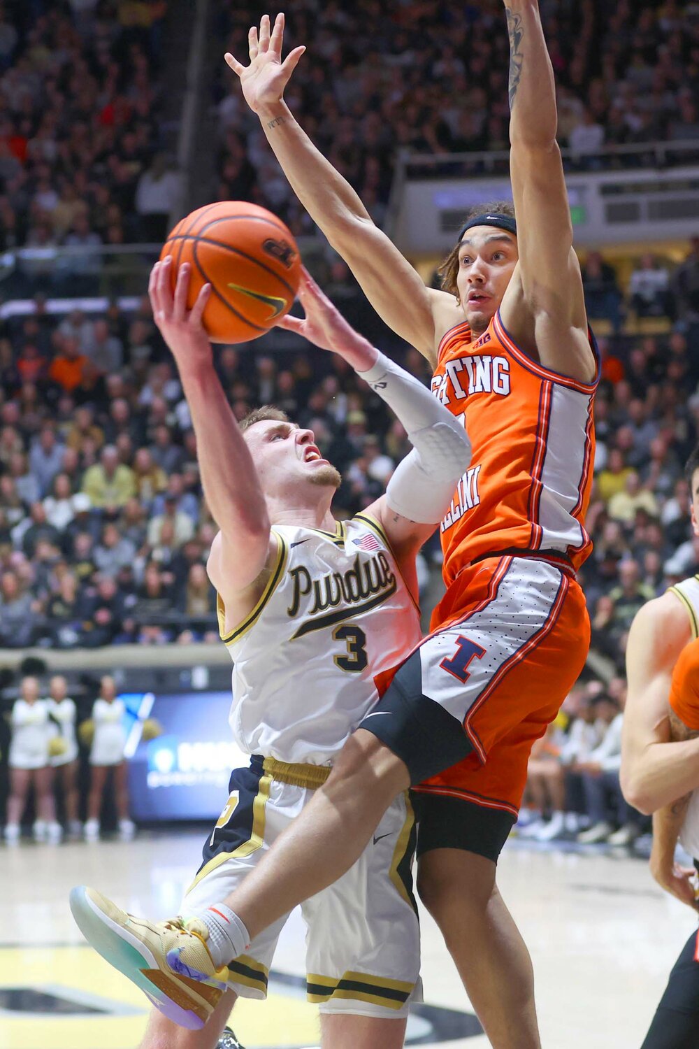 Dra Gibbs-Lawhorn of Illinois - crashing into Braden Smith of Purdue while trying to block a lay-up