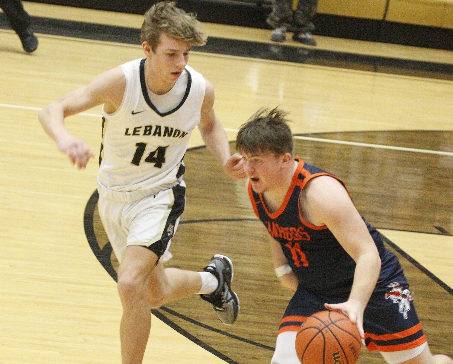North's Ross Dyson drives the ball across mid-court during the Chargers 5-29 loss to Lebanon.