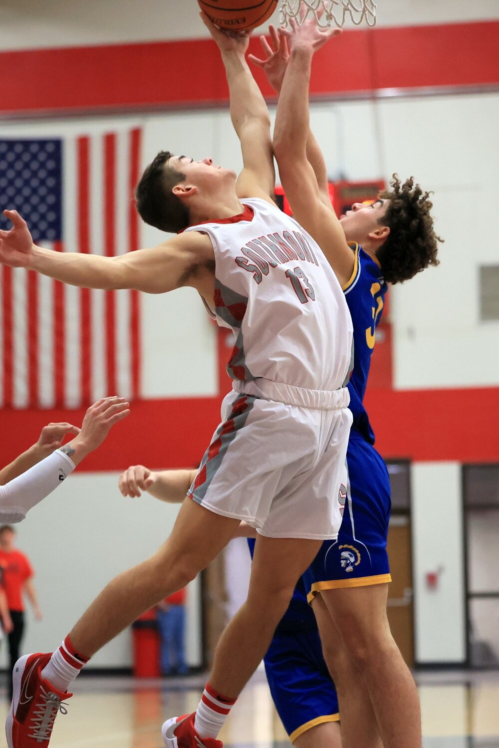 South's Lucas Oppy and Cville's Alec Saidian battle for a rebound.