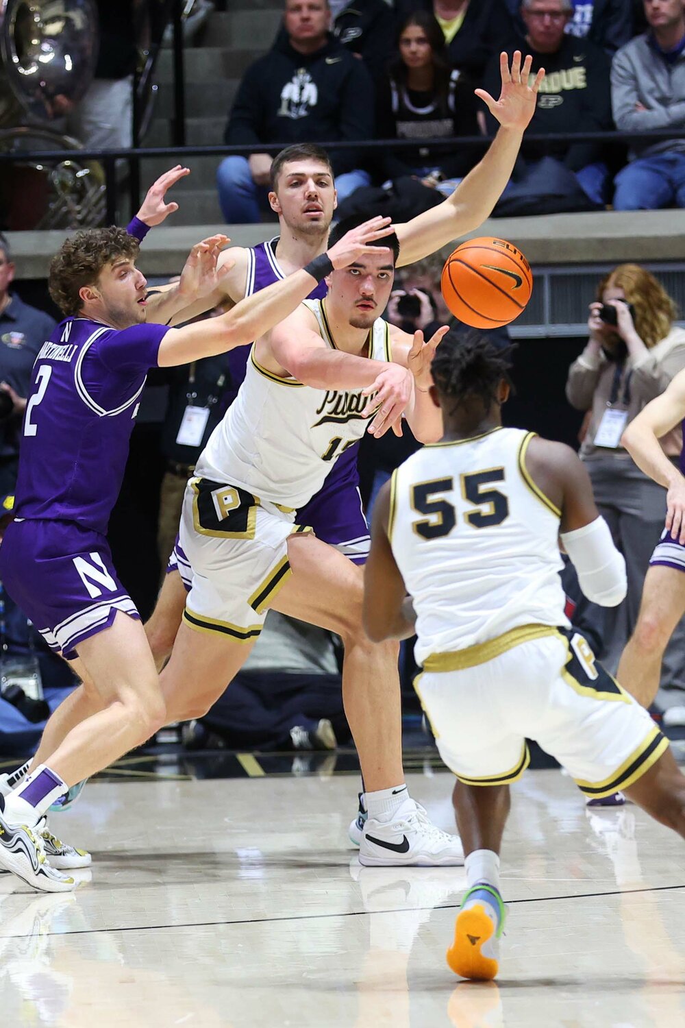 Zach Edey of Purdue - passing out of a Northwestern double team to Lance Jones