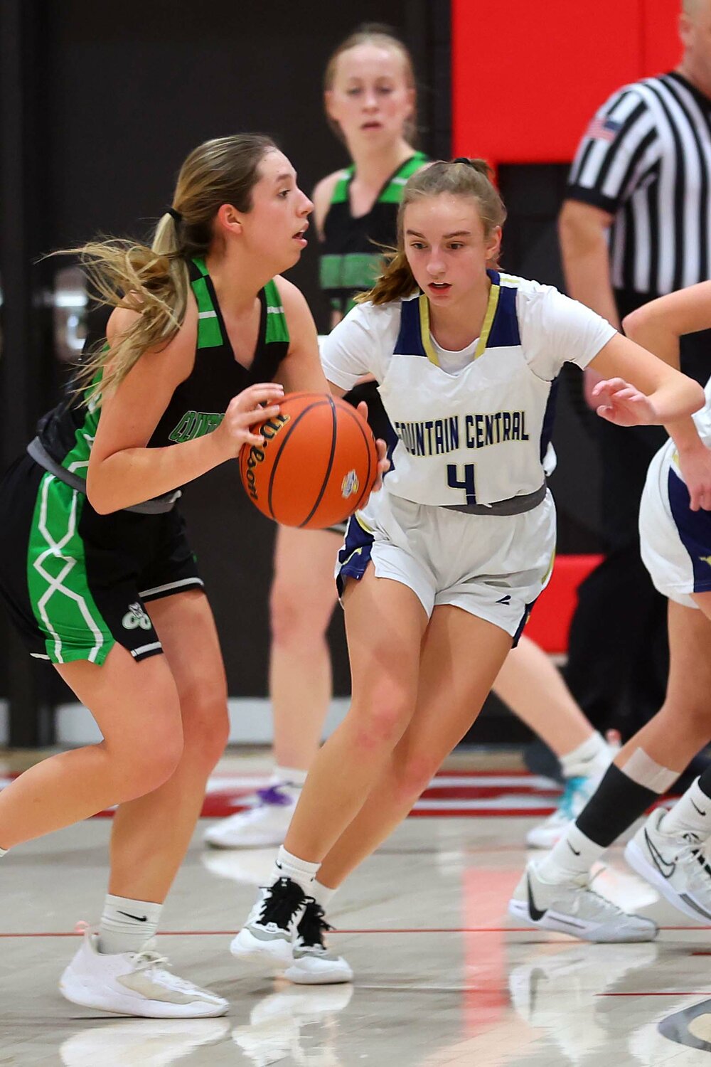 Rylee Simko of Fountain Central - guarding Riley Dellinger of Clinton Central