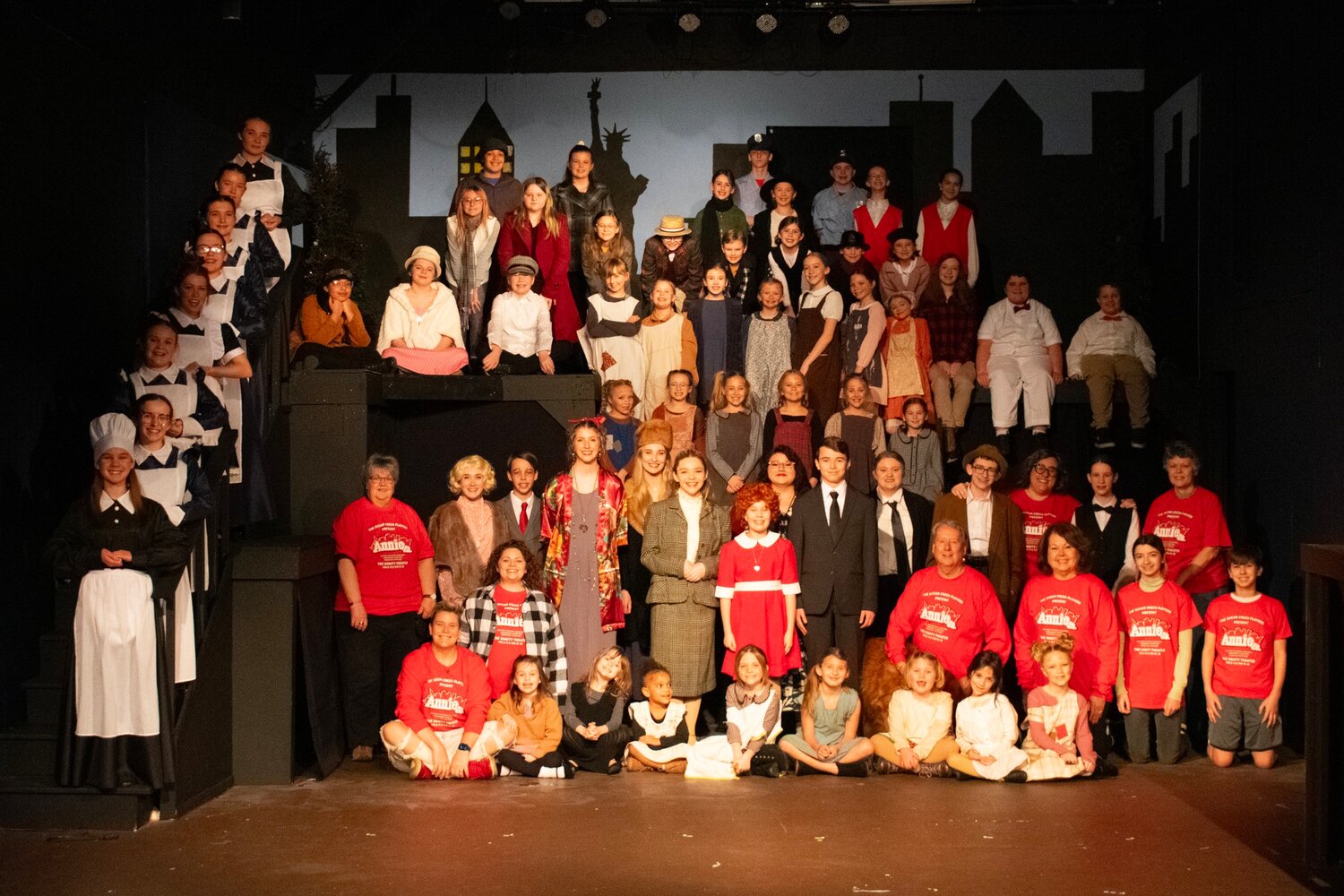 The cast of Annie Jr. features more than 70 children from all three county school districts and beyond.