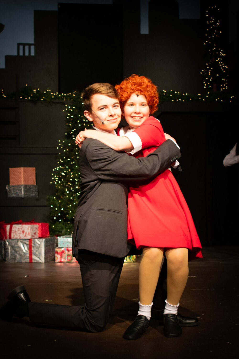 Ben Oppy (Oliver Warbucks) and Haleigh King (Annie) rehearse a scene for the upcoming production of Annie Jr. at the Vanity Theater.