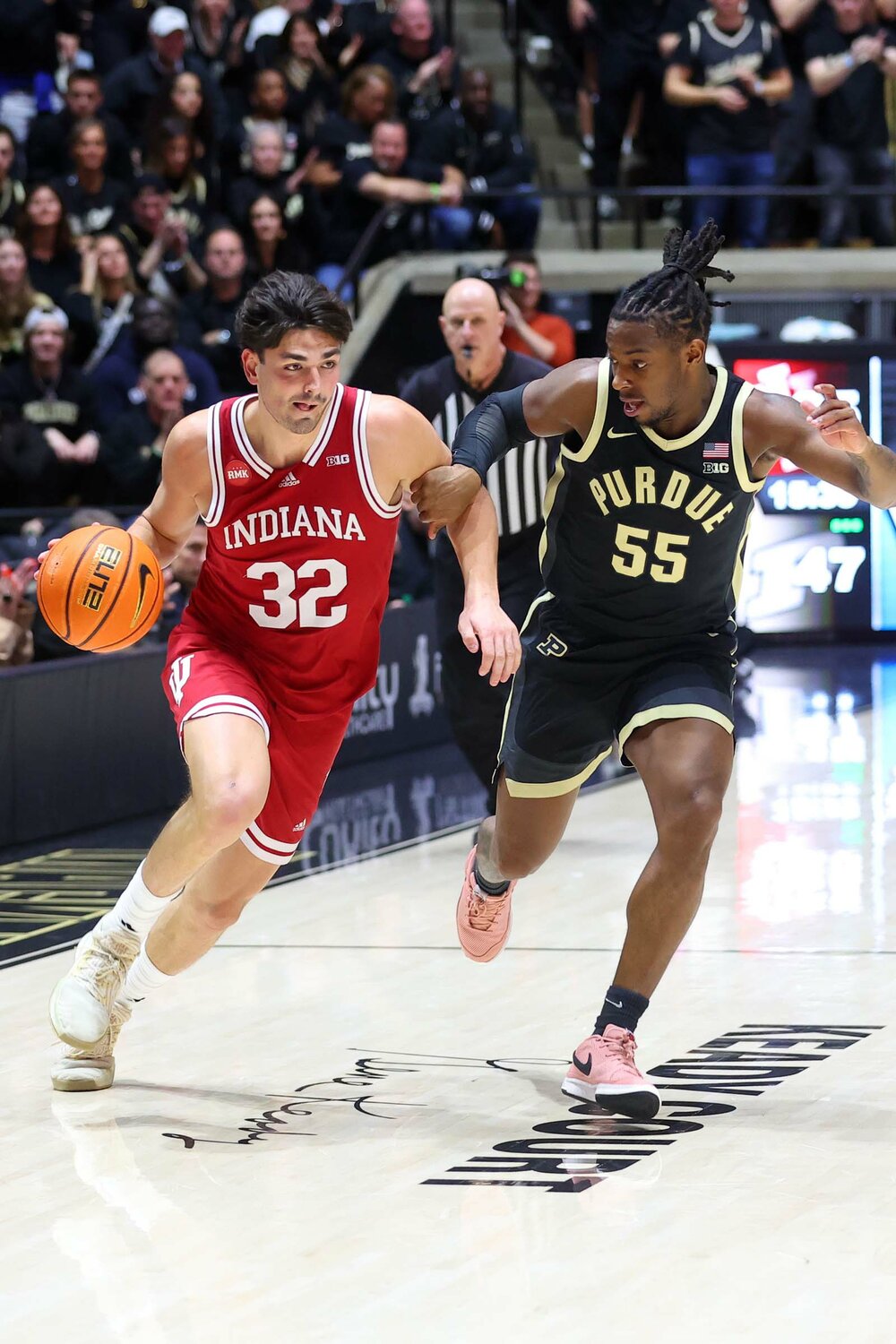Trey Galloway of Indiana - driving on a fast break against Lance Jones of Purdue