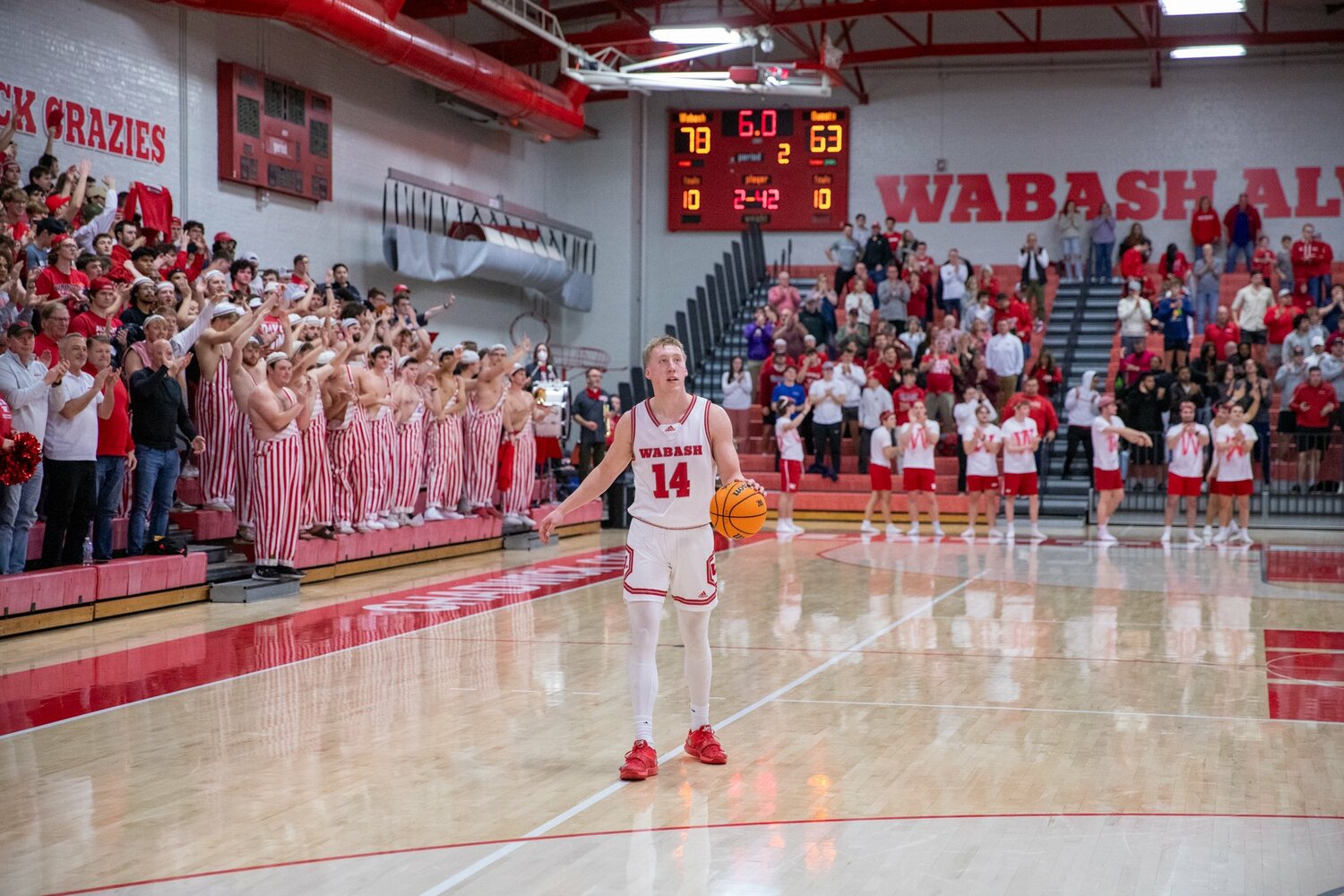 Senior Sam Comer dribbles out the final seconds of Wabash's 78-63 win over Denison in the NCAC semi-finals. For the 3rd straight season Wabash will take on Wooster in the championship game.