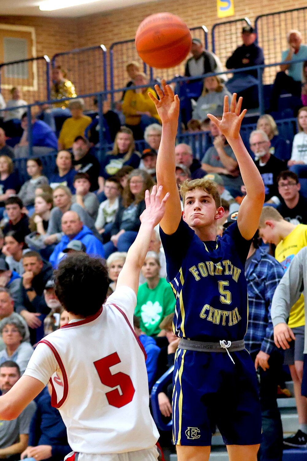 Eli Foxworthy of Fountain Central - shooting a three-pointer