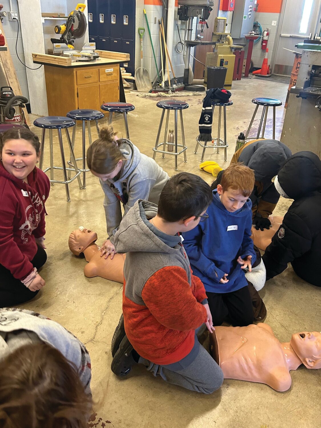 Sommer Elementary students practice CPR at the health safety station