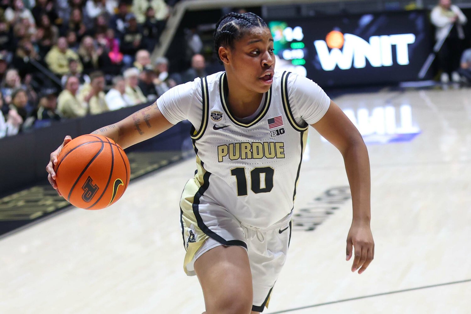 Jeanae Terry of Purdue - driving toward the basket in a game versus Vermont where she set the Purdue single-season assist record.