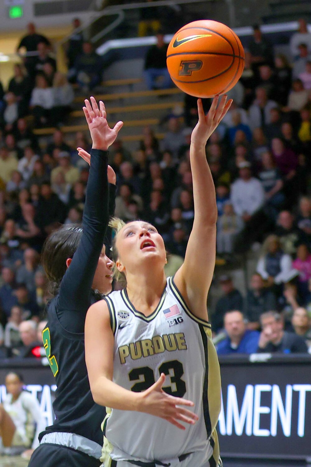 Abbey Ellis of Purdue - scooping a lay-up against Vermont