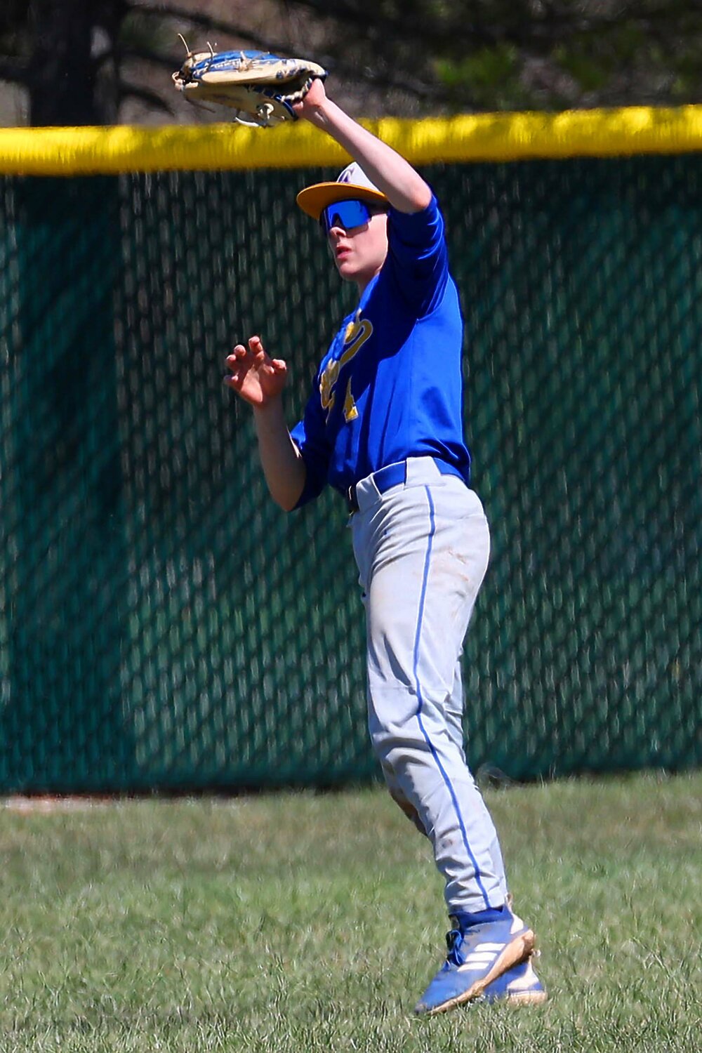 Mason McCarty of Crawfordsville - catching a fly in right field to end the game
