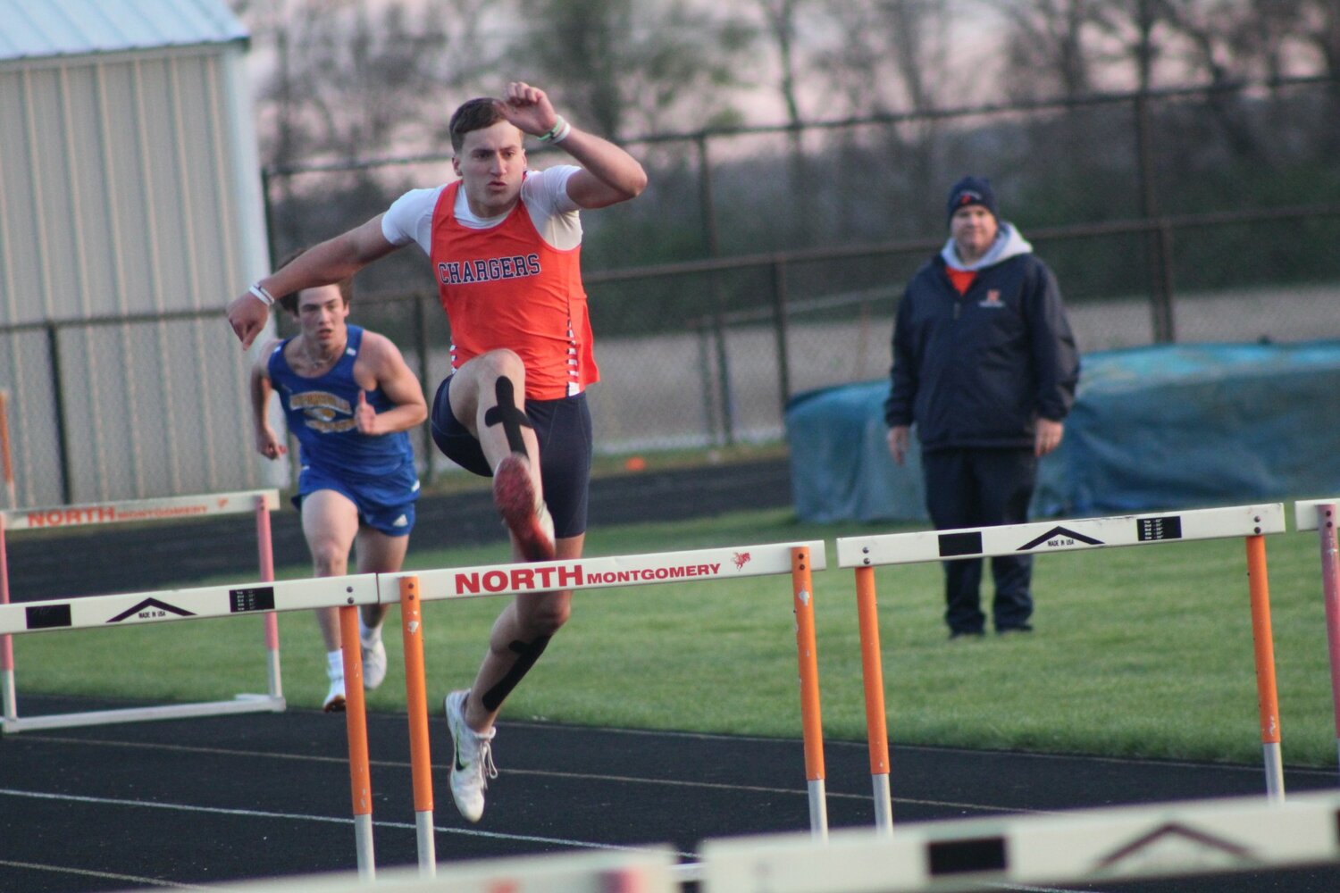 Junior Kelby Harwood ran in the co0ed hurdles for the Chargers.