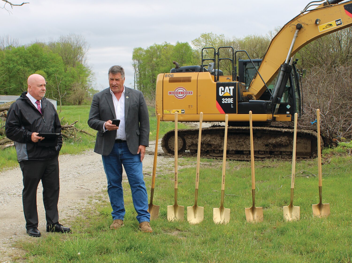 Mayor Todd Barton and Montgomery County Commissioner John Frey share remarks at the ground breaking ceremony Monday.