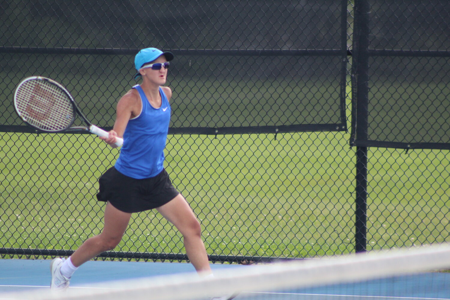 Cville's Reagan Cox was first off the courts with her win at two singles.