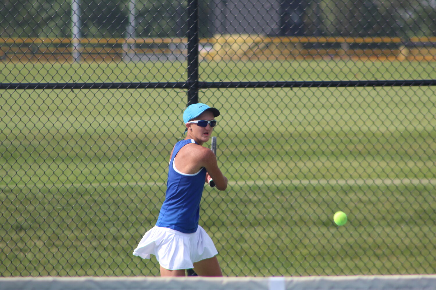 Reagan Cox battled through some heat exhaustion during her match at two singles but still came out on top in three sets. Cox will return for her senior season next year.