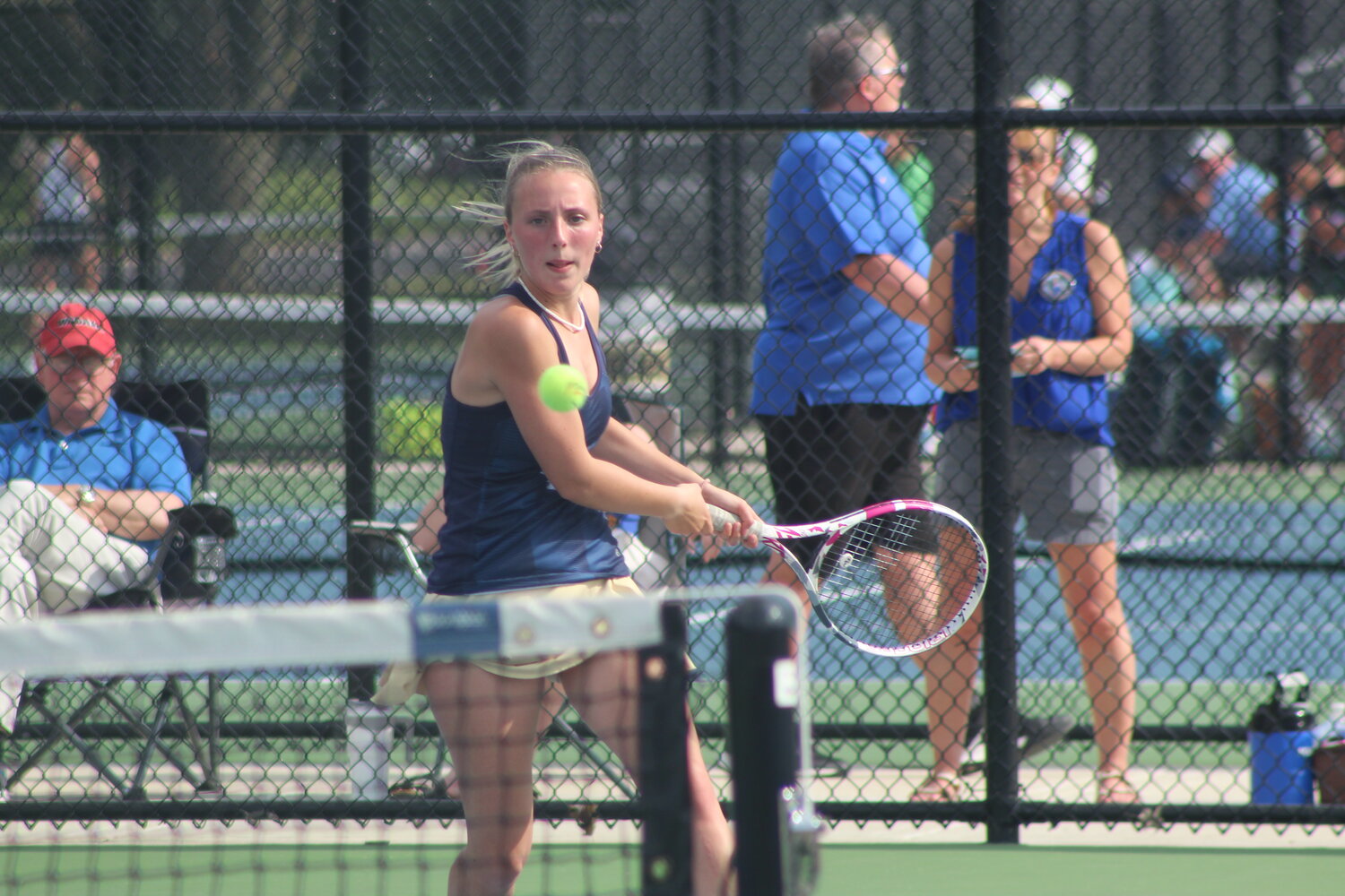 Josie Harshbarger returns a ball back over the net as she and Lilly Peterson were 7-5, 7-5 winners.