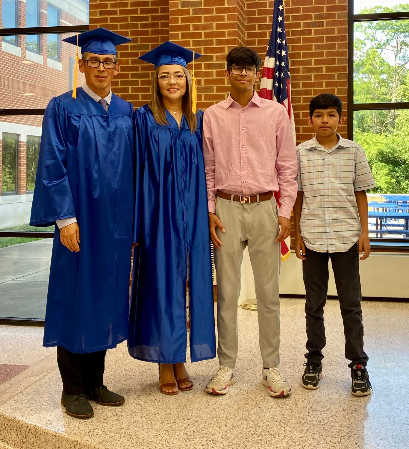 Jose Angulo and his wife, Blanco Asamore graduated together.