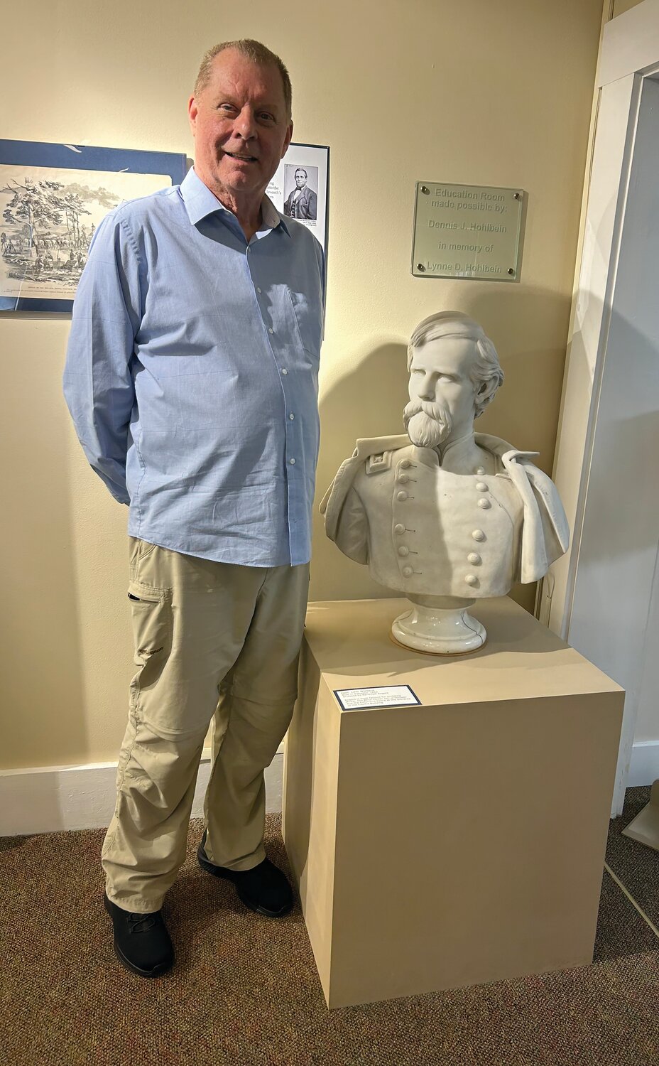 Crawfordsville native Michael E. Fox recently published “Lew, The Life and Times of the Author of Ben Hur.” He is pictured during a recent book-signing event with a bust of Gen. Lew Wallace which is on display at the Gen. Lew Wallace Study and Museum.