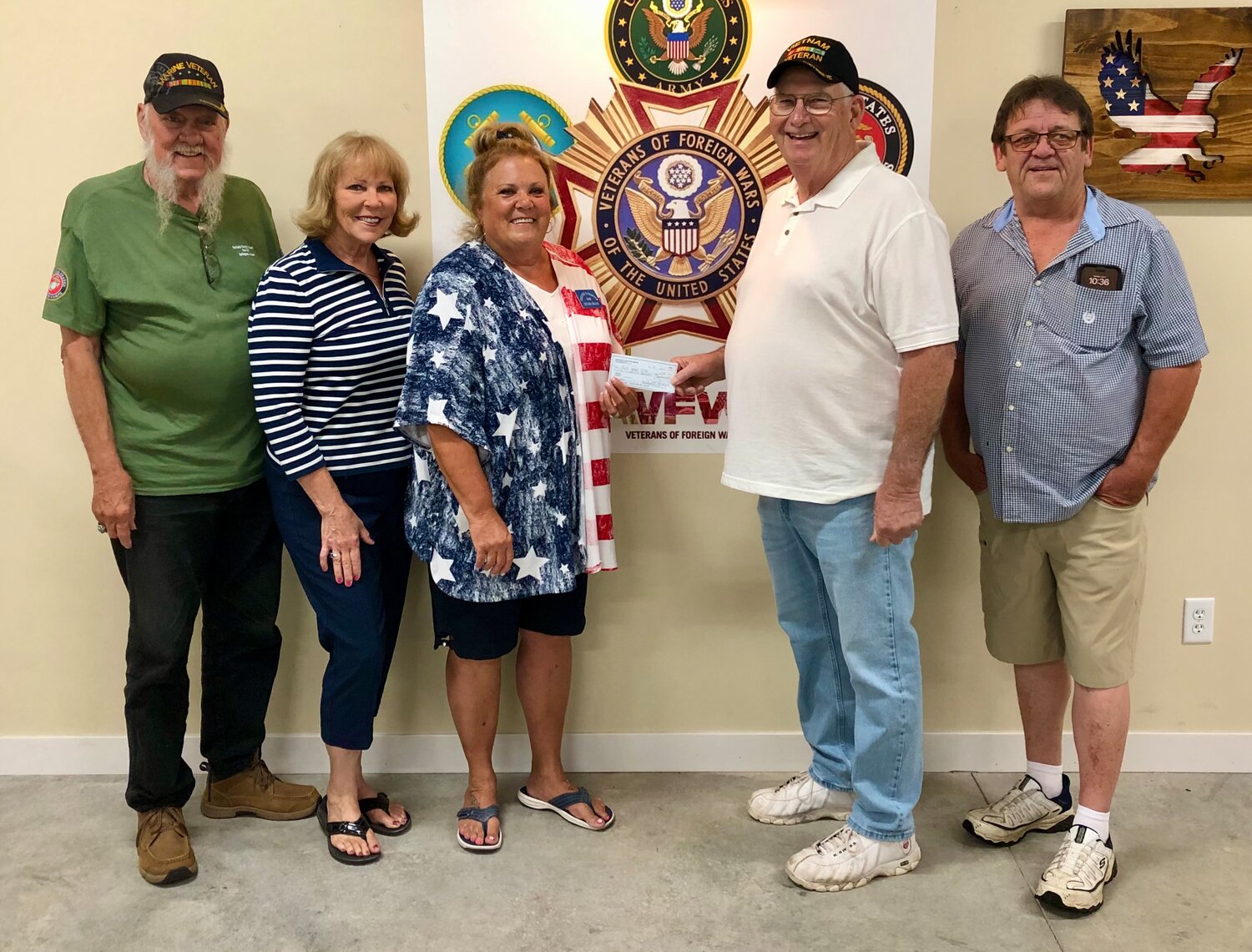 Pictured, from left, Covington VFW Post 2395 Commander Gary Lawson, Susan Fisher, Trudie Dillon, Gary Stark and Cliff Powell.