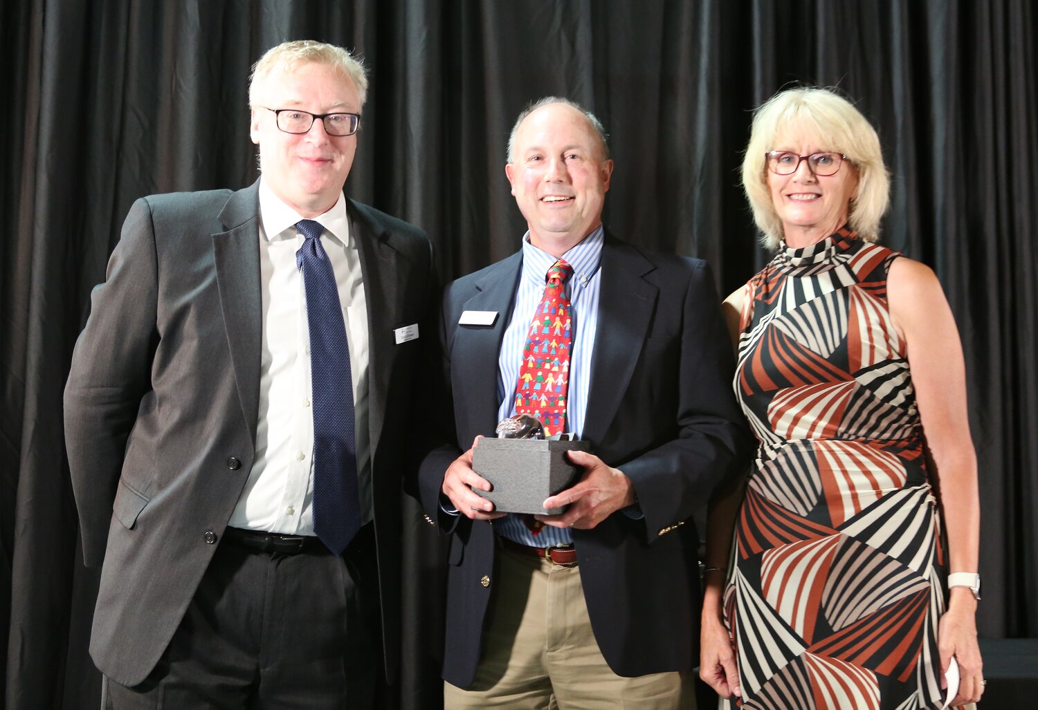 Pictured, from left, David Johnson, Dr. John Roberts and Donna Hendrickson.