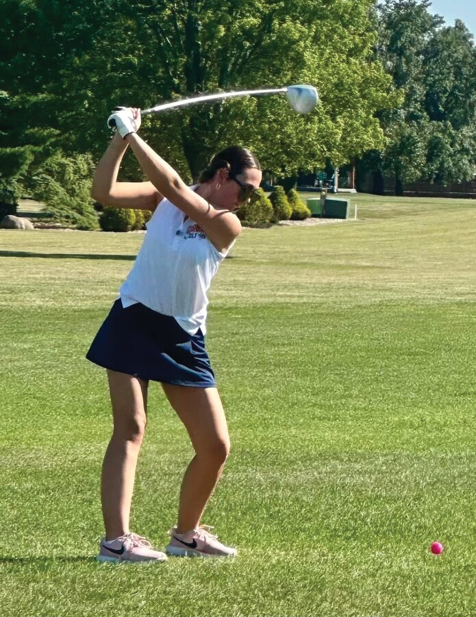 North Montgomery senior Emma Pyle tees off Wednesday during the senior night victory over Lebanon at Rocky Ridge.