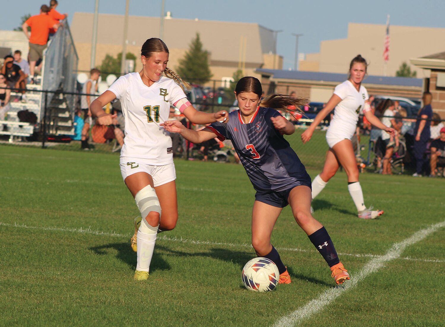 North Montgomery's Alexis Bennett attempts to take the ball away from a Benton Central player in Tuesday 's 3-1 Charger win.