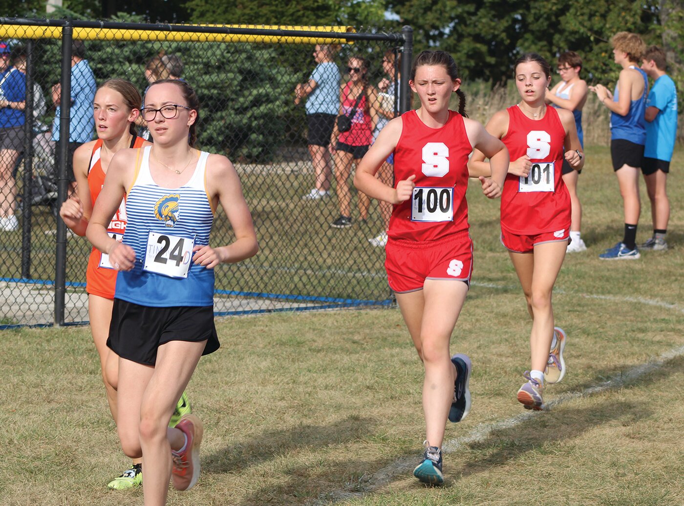 Crawfordsville's Melanie Dowd and Southmont's Darby Cottrell and Jaysa Crull compete in Thursday's Charger Classic.