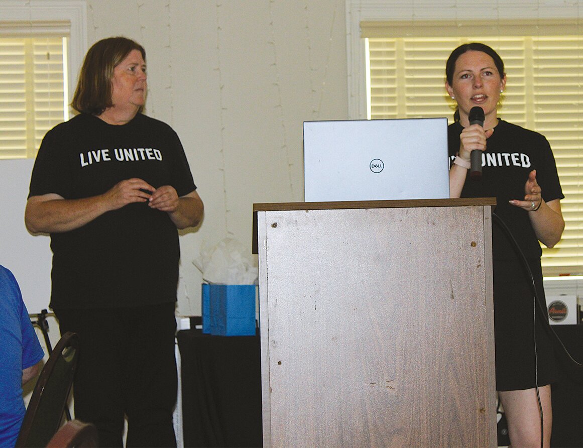 Allison Huenemann, general manager of Crawfordsville Electric Light and Power and this year’s campaign chairman, shares her message. Gina Haile, director of the local United Way agency, also is pictured.