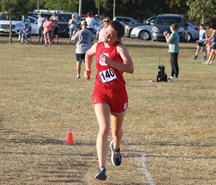 Southmont's Darby Cottrell crosses the finish line in thrid place in the Montgomery County Cross Meet.