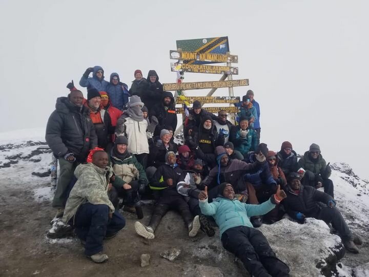 Group at the summit of Mount Kilimanjaro.