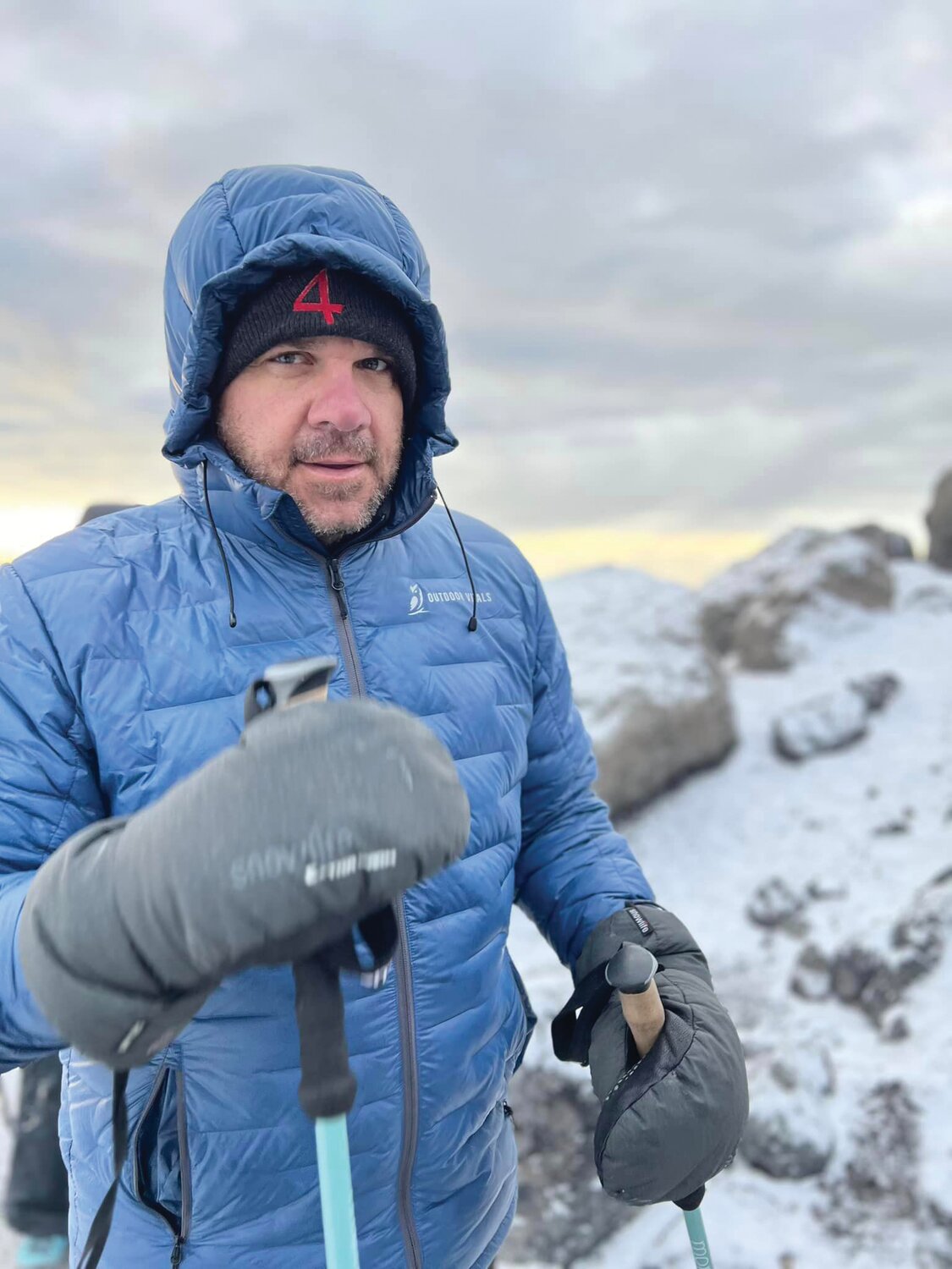 Jonn Bowersock atop Mount Kilimanjaro.