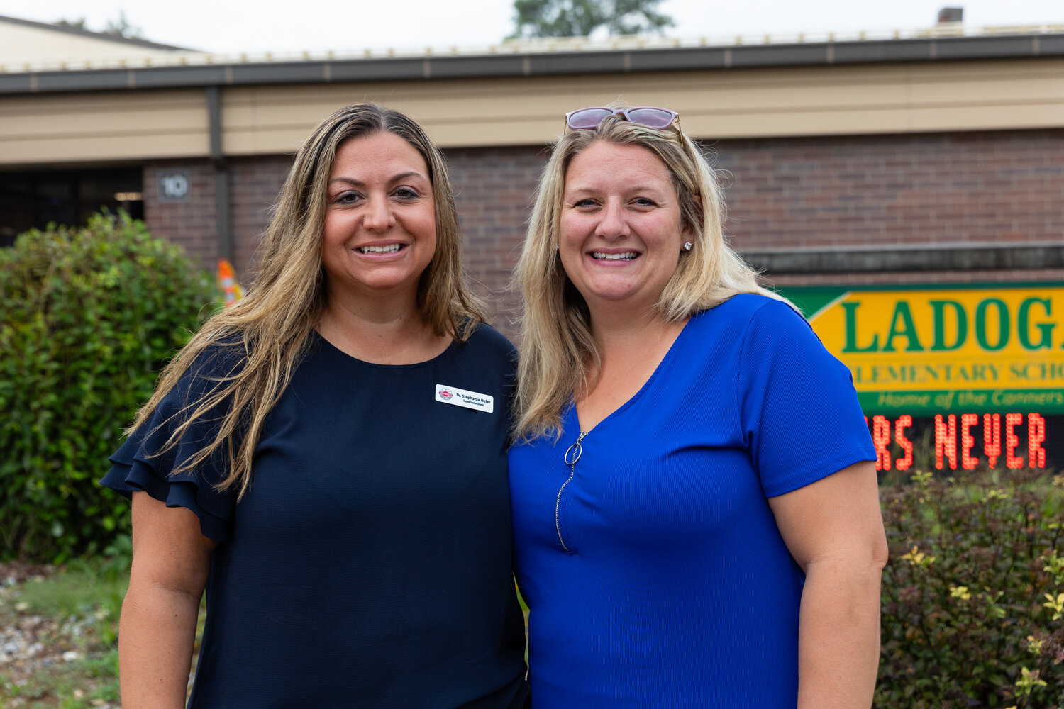 Dr. Stephanie Hofer, left, commended Ladoga Principal Kristin Paris for her leadership.