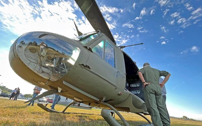 Passengers ride in this Huey at last year's Festival of the Turning Leaves at Thorntown.