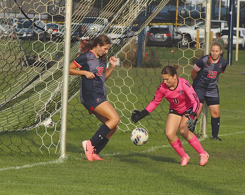 North Montgomery goalkeeper Ella Smith stops a shot short of the goal at Thursday.