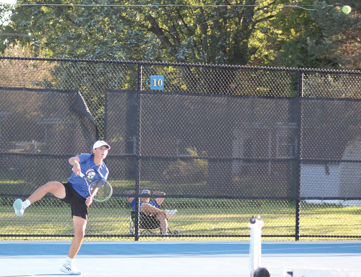 Henry Bannon returns the ball Thursday during a match with Lebanon.