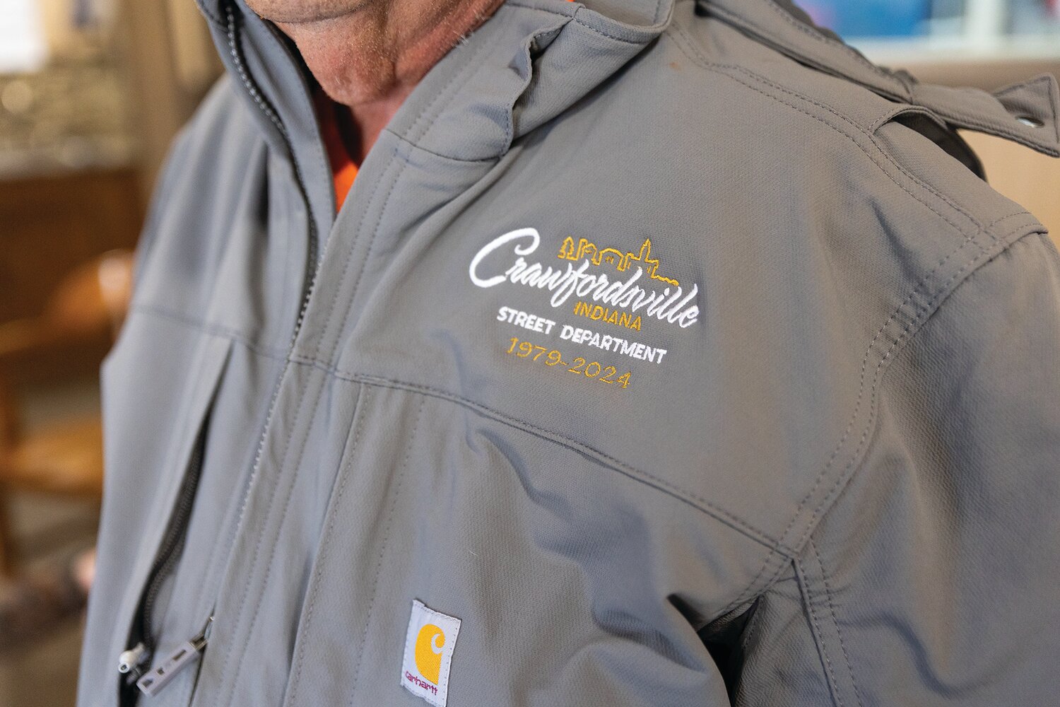 The Crawfordsville Street Departments gave Larry Hunt a personalized jacket as a retirement gift on Friday.