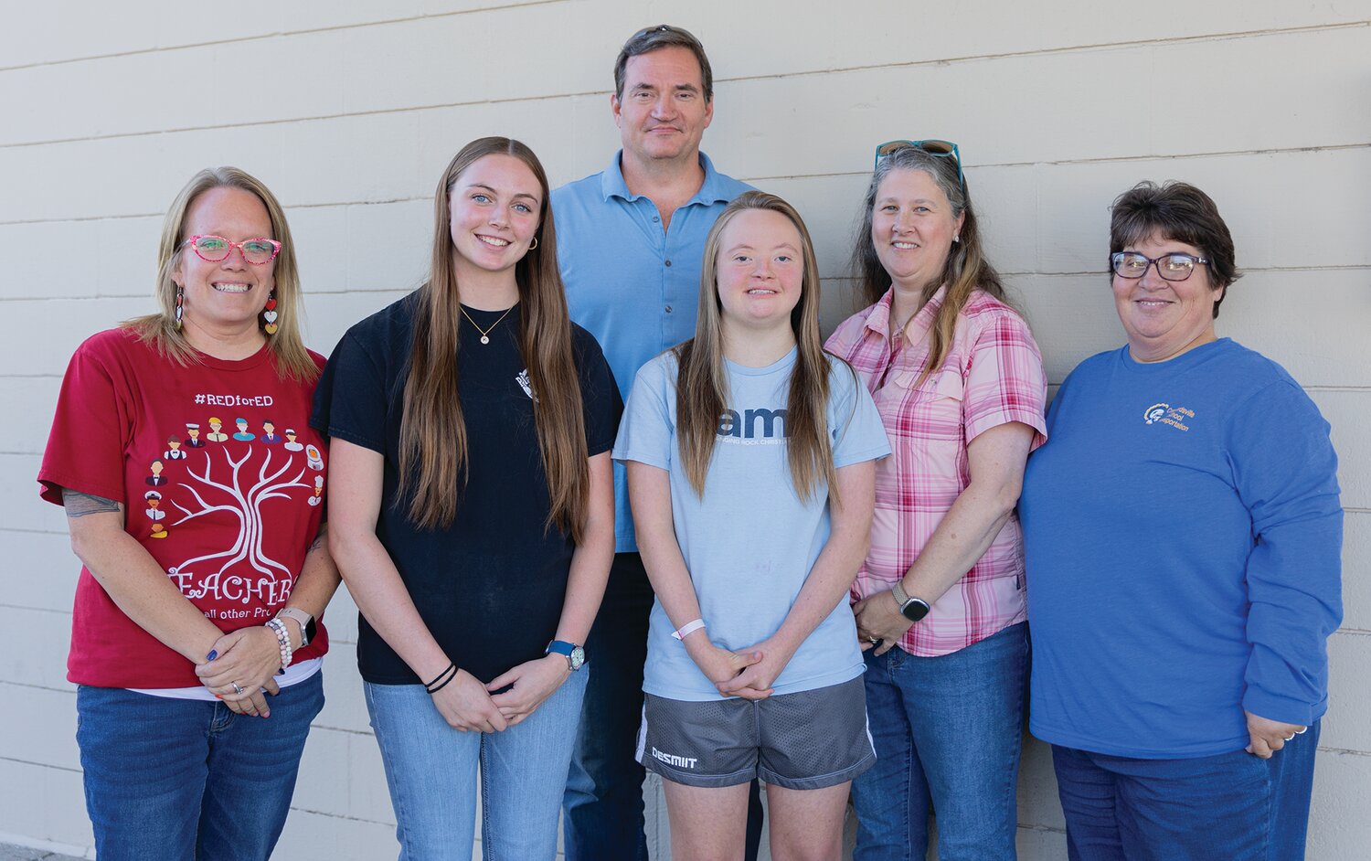 Maddie Lewellyn posing with parents, coaches, and long-time friend. From left: Erin Gilland, Campbell White, Chris Lewellyn, Maddie Lewellyn, Candy Lewellyn, Laura Nantais, Oct. 2.