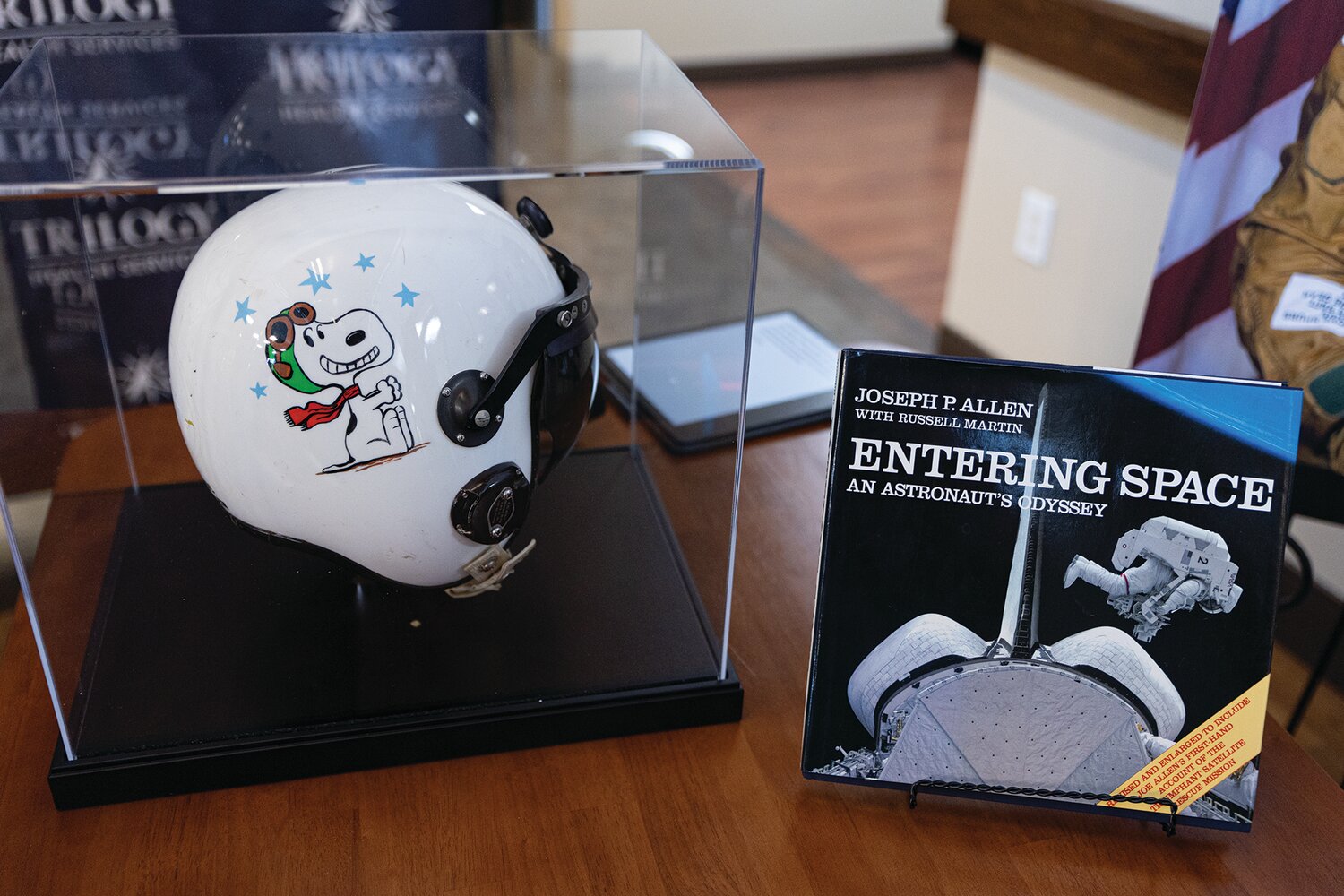 Joseph P. Allen's original astronaut helmet and his published book, Oct. 15.