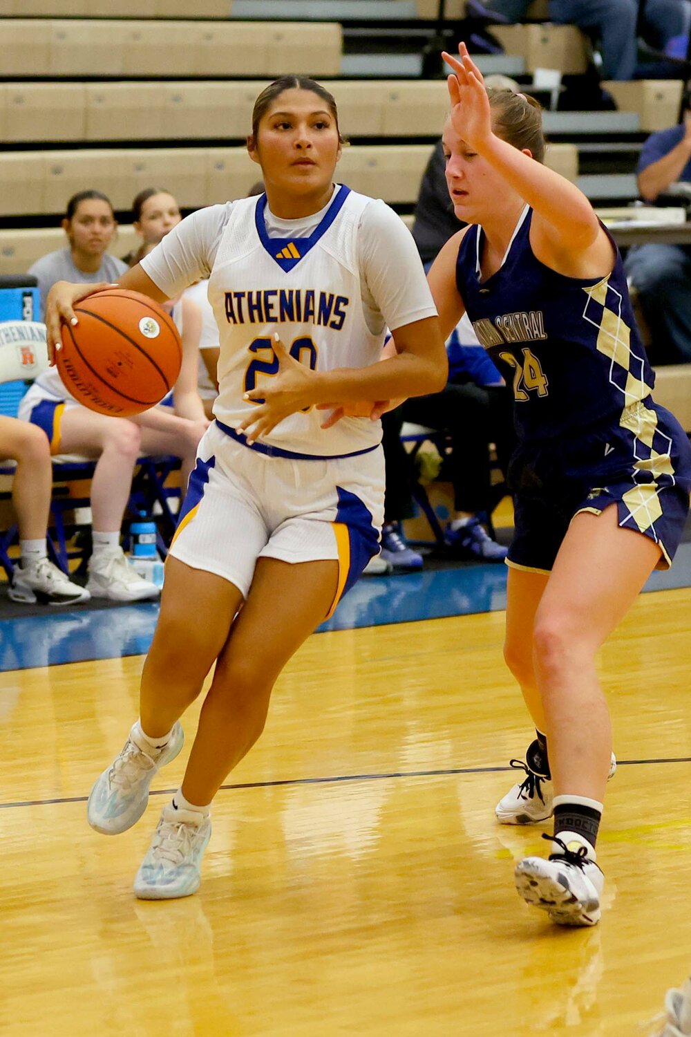 Litzy Huesca of Crawfordsville drives against Aubrey Ashwill of Fountain Central.