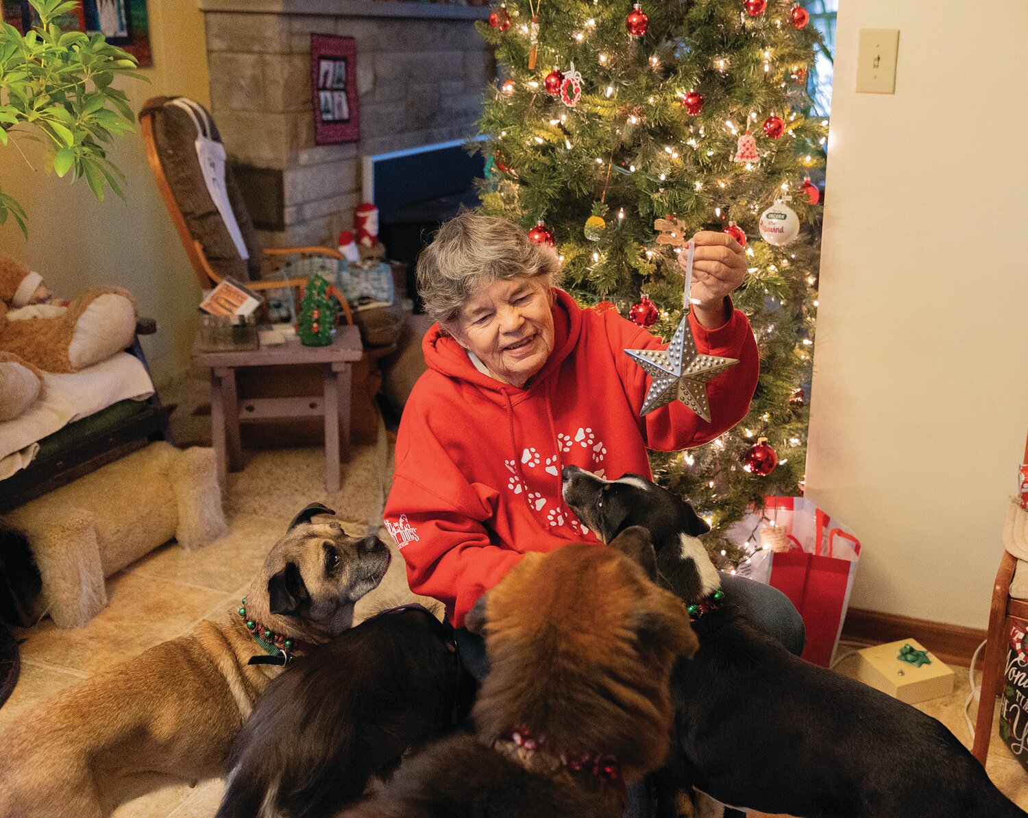 Terry Lawrence with her four dogs, Dolly, Punkin, Muppet and Elmo.