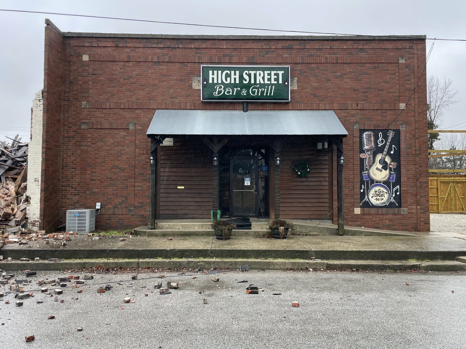 The High Street Bar & Grill was heavily damaged Sunday as a result of the collapse of the adjacent building.
