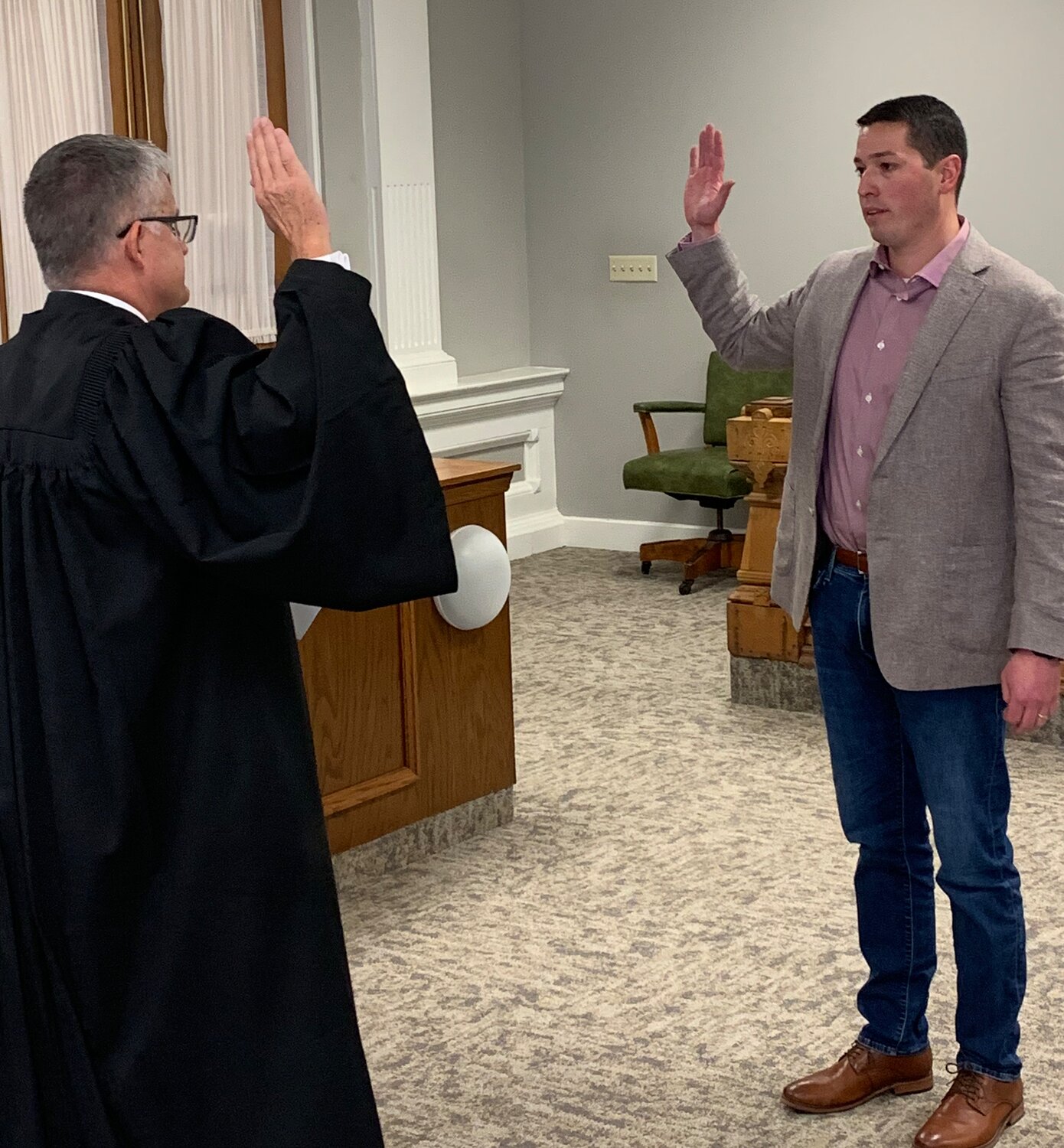 Montgomery Circuit Court Judge Darren Chadd administers the oath of office Monday to the new county officeholders. Pictured are Jake Bohlander, who was elected to serve as a county commissioner; Mike Warren, who replaces Bohlander on the county council; Nancy Cox as county recorder; and Sondra Sixberry as county clerk. Both Cox and Sixberry were previously appointed to complete the vacated terms of the previous officeholders, and are now serving their first elected term.