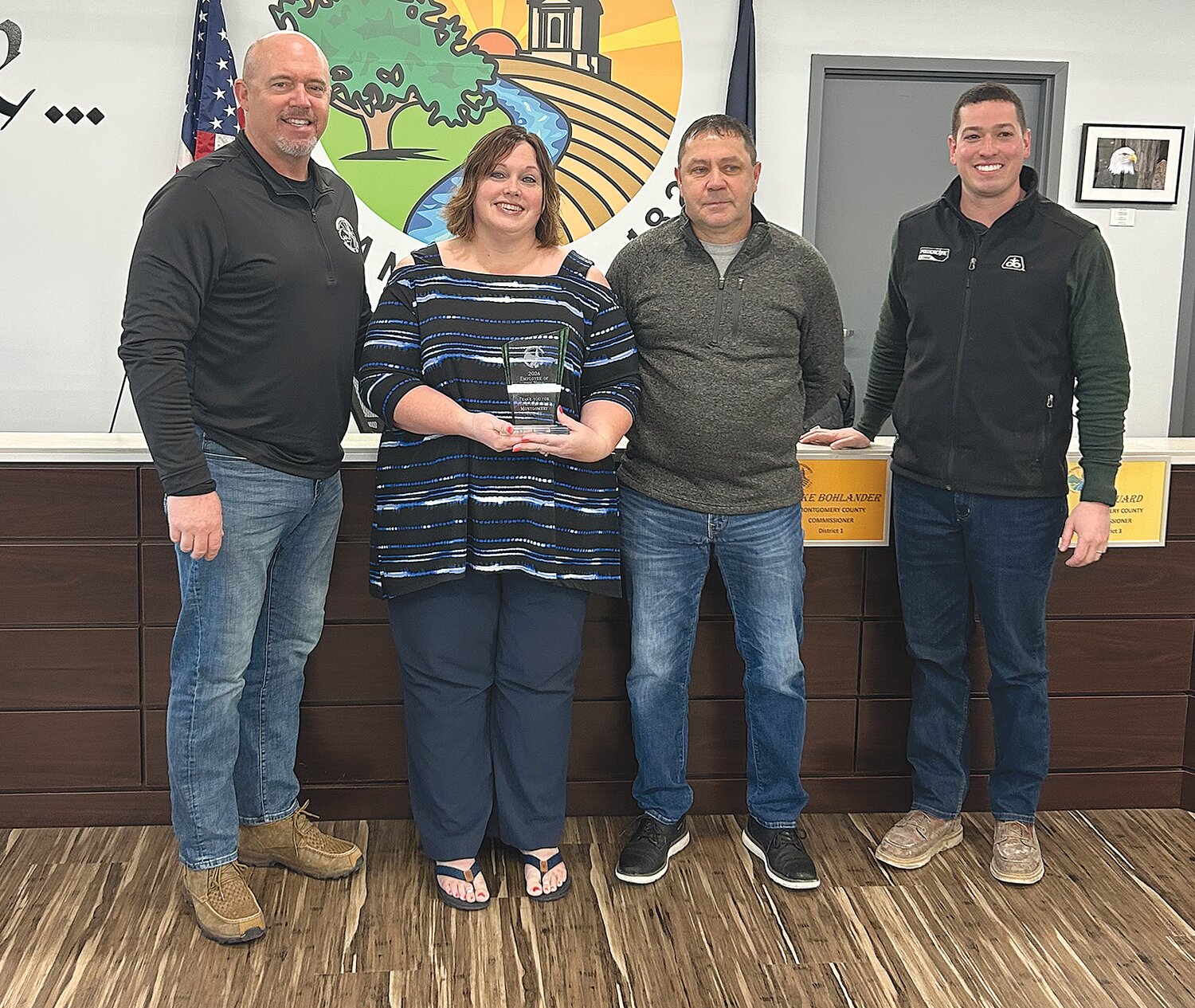 Andria Geigle was selected as the Montgomery County Employee of the Year. She is pictured with Montgomery County Commissioners, Dan Guard, Jim Fulwider and Jake Bohlander.