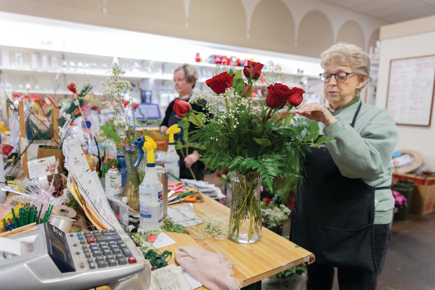 Milligan’s Flowers & Gifts, 115 E. Main St., had a tall list of orders to fill on Thursday, many including last-minute calls for Valentine’s Day bouquets. Susan Rosen, the owner of the shop, said that the florists would most likely be working until 9 or 10 p.m. to fulfill every order.