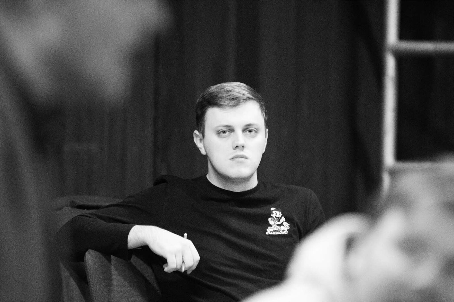 Wabash College senior theater major and 12 Angry Men director Logan Weilbaker observes the cast during a recent rehearsal.