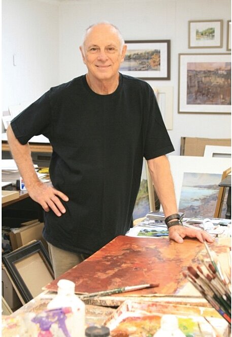 Jerry Smith poses in his studio and gallery on South Green Street in Crawfordsville.