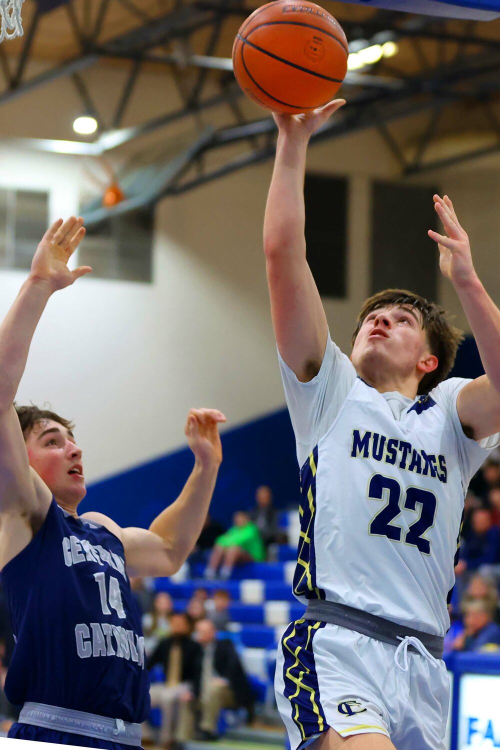 Ayden Batchelor of Fountain Central - shooting over Mikey Stapleton of Lafatette Central Catholic