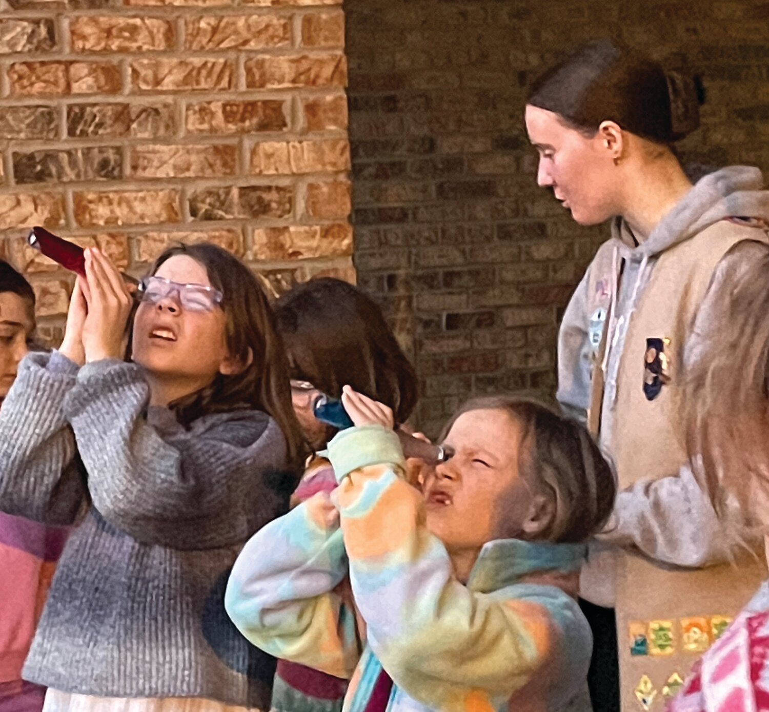 Girl Scout Troop 57078 hosted a gathering of other troops in the community to learn about the Globe at Night Citizen Science project (https://globeatnight.org/). Younger troops were invited to learn about light pollution, constellations, and citizen science through interactive activities. One of these was using Oreos to create the phases of the moon. The girls also observed the night sky.. The idea was taken from the Dark Skies Initiative, which educates citizens about light pollution and encourages them to take action against it. Light clutter is the light created by human sources that interferes with viewing the night sky and causes problems for wildlife. The more the civilization grows, the more light pollution grows with it. It is important to take action against light clutter.. Go to https://darksky.org/ to learn more about the negative effects of light pollution and what you can do to help.