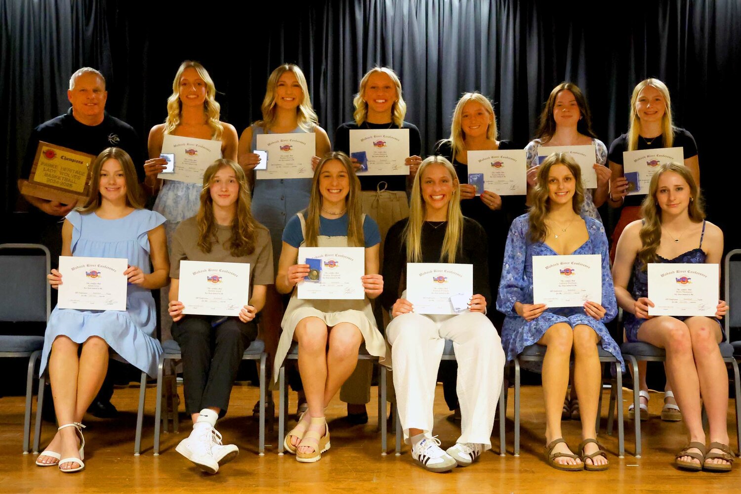 Members of the 2024-25 All-WRC girl’s basketball team are, from left, front row, Aleah Cruz (A), Henley Good (FC), Brailey Hoagland (FC), Hannah Prickett (FC), Cadence Dunham (NV) and Nora Thomann (NV); and back row, Coach Mark Harper (PH), Addilee Jenkins (PH), Raegan Ramsay (PH), Emma Simpson (PH), Haylee Mathas (RP), Caleigh Purcell (S) and Cadence White (S). Photos of additional All-WRC teams will be published in upcoming editions of the Journal Review.
