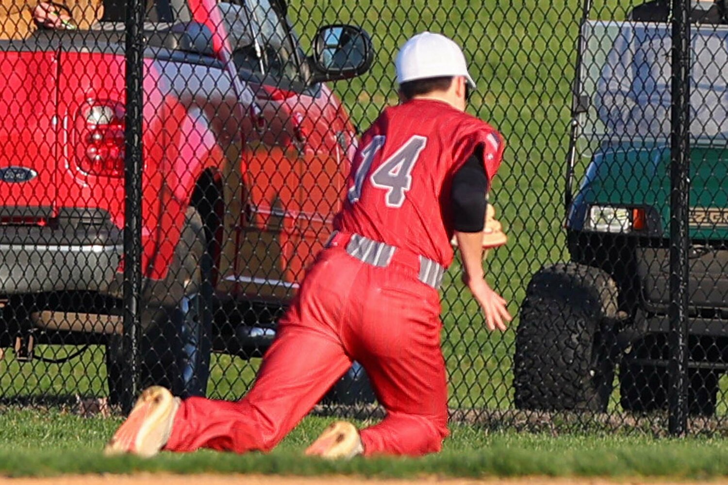 Landon Grimes of Southmont dives to try to catch a foul ball down the first base line.